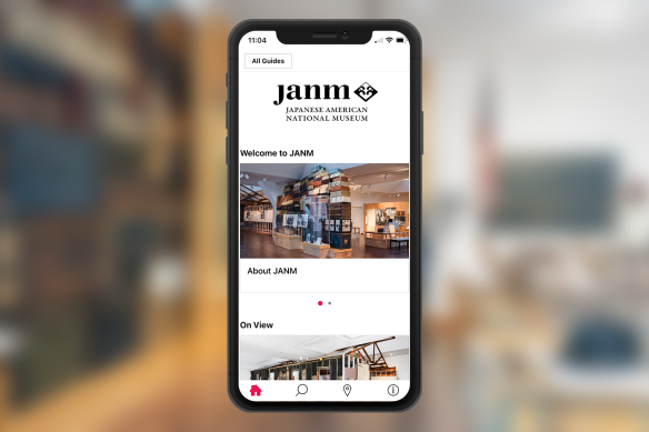 smartphone with screen showing bloomberg connects museum app